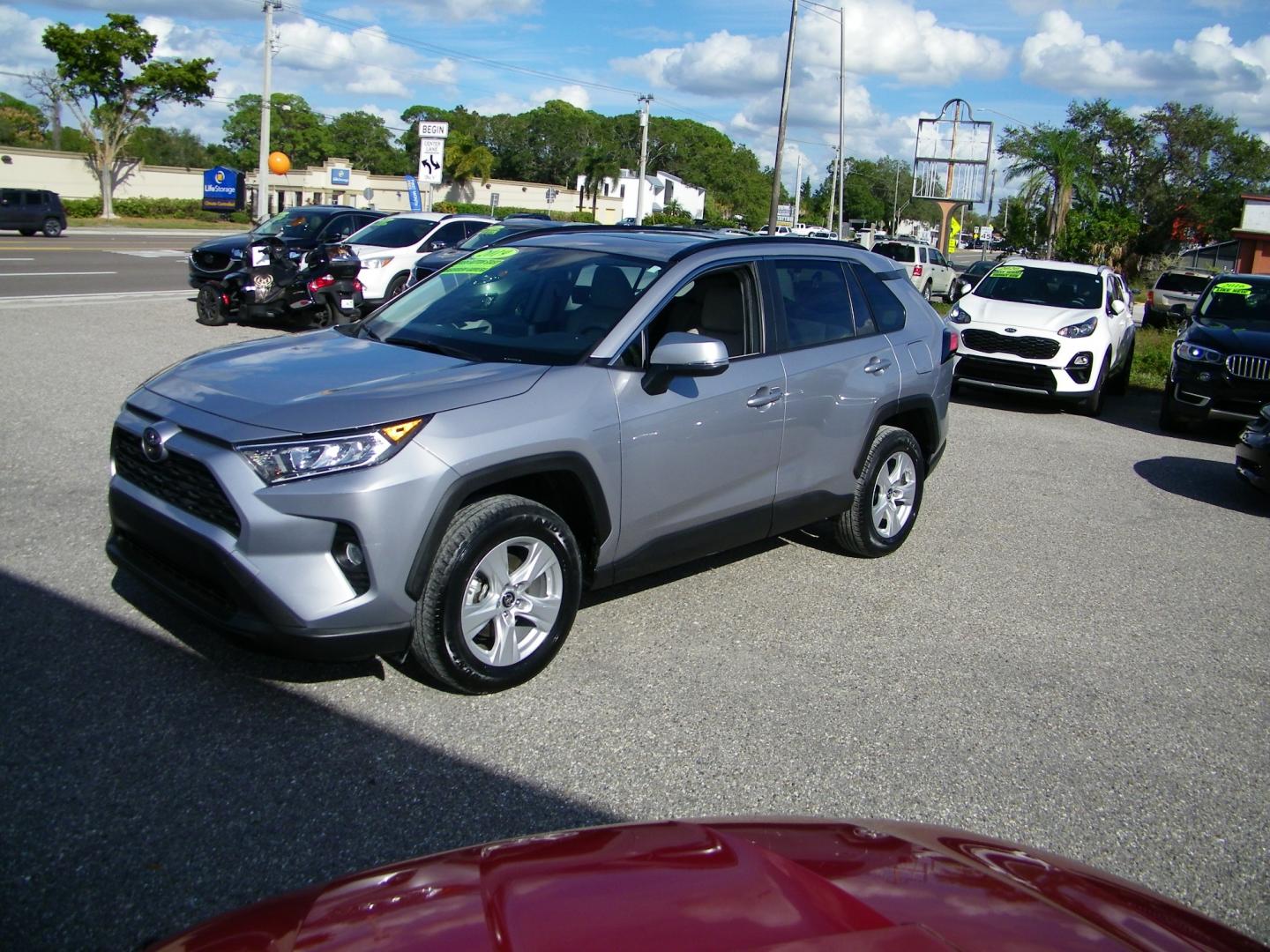 2019 Silver /Tan Toyota RAV4 XLE (JTMW1RFV2KD) with an 2.5L L4 DOHC 16V engine, 8A transmission, located at 4000 Bee Ridge Road, Sarasota, FL, 34233, (941) 926-0300, 27.298664, -82.489151 - Photo#0